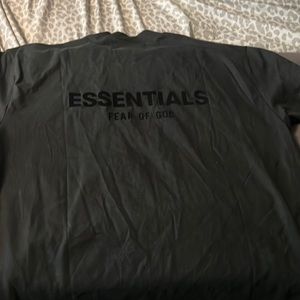 Black Essential shirt size M ( run bigs)